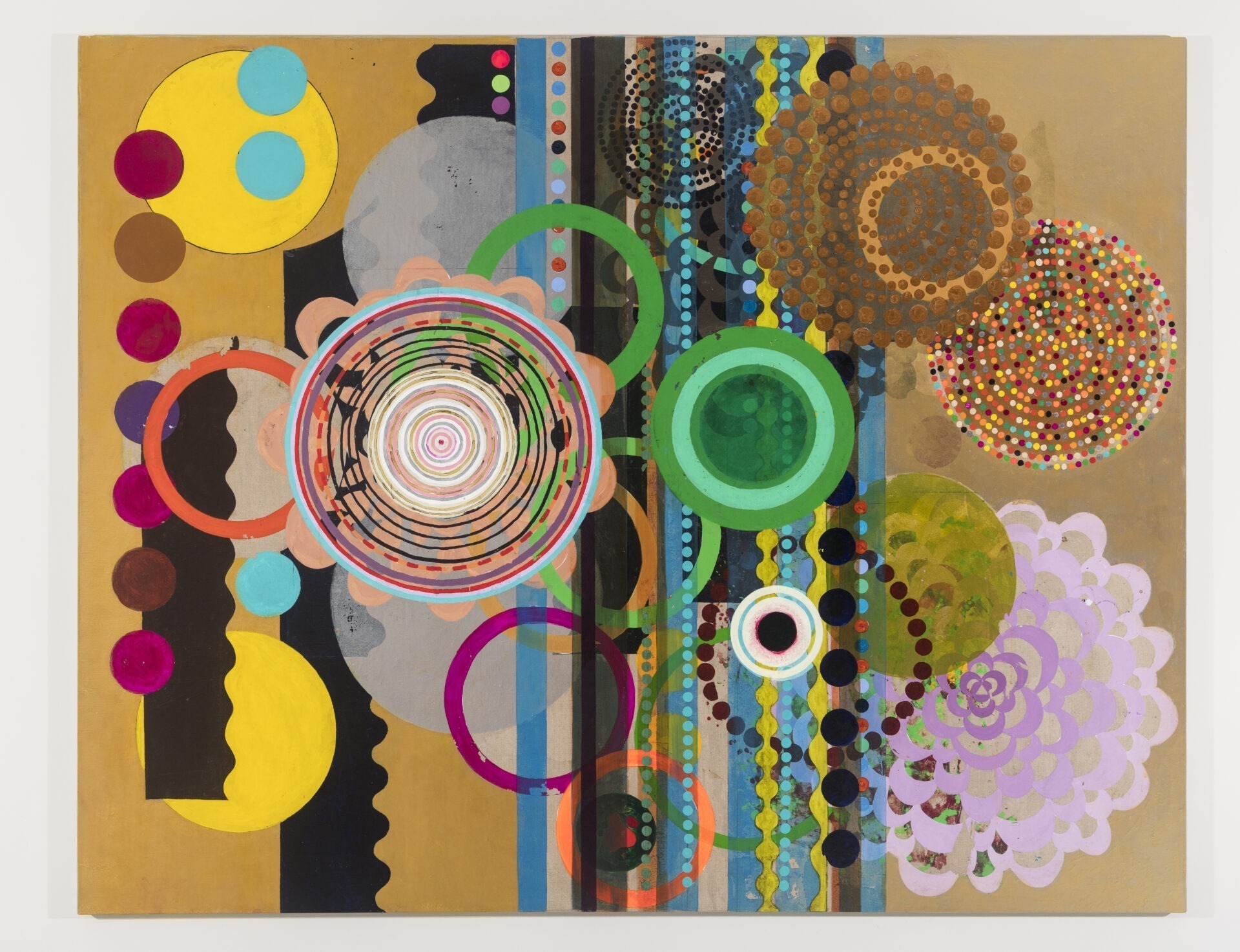 Descrição da imagem: Pintura geométrica colorida. Círculos de diferentes tamanhos e cores, sobrepostos e distribuídos por toda a superfície. Ao centro, levemente à esquerda, há uma figura circular composta por anéis concêntricos coloridos em azul, vermelho, roxo, laranja, preto, rosa, amarelo, cinza e branco. Ao redor, diversas formas circulares em amarelo, rosa, verde, roxo, laranja, lilás e marrom, algumas preenchidas por padrões de bolinhas e linhas. Fim da descrição. 